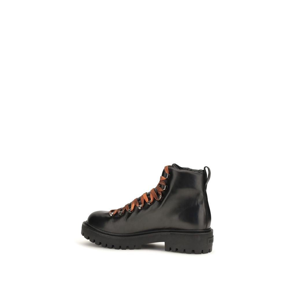 Discover the Prada Black Calf Leather Bos Taurus Lace-Up Boots, where exquisite craftsmanship meets luxury. Elevate your style with unparalleled comfort and timeless elegance.