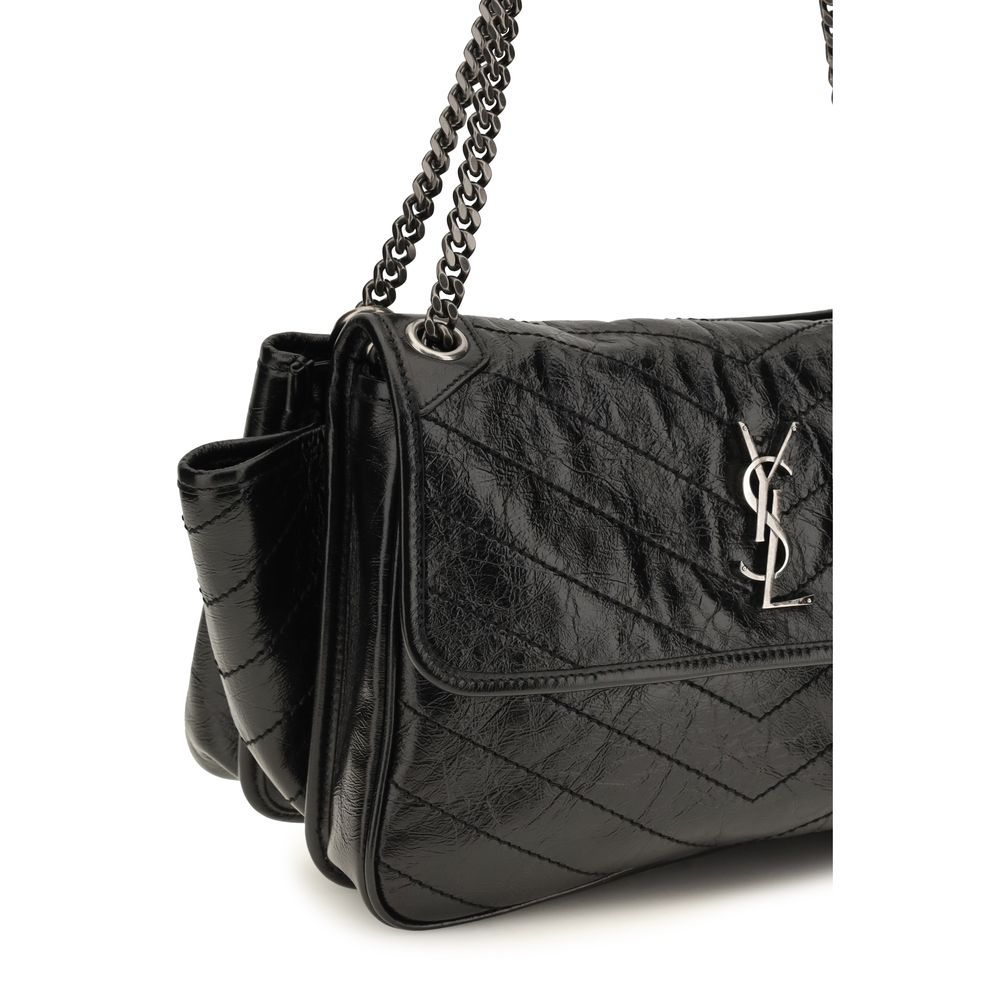 Experience the allure of the Saint Laurent Black Calf Leather Bos Taurus Shoulder Bag, a masterpiece of refined craftsmanship and timeless elegance, perfect for the discerning connoisseur.