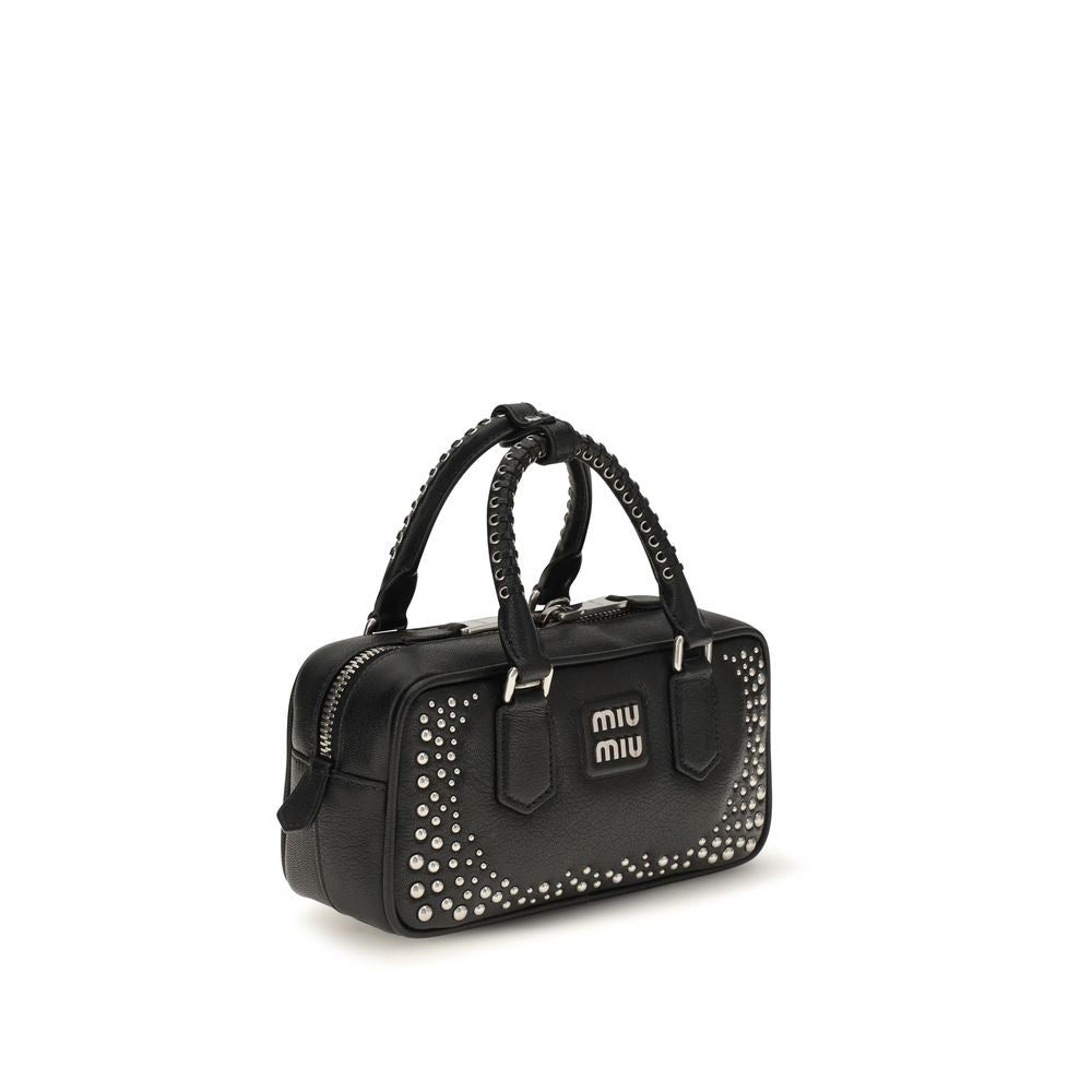 Elevate your style with the Miu Miu Black Calf Leather Bos Taurus Shoulder Bag, a masterpiece of supple leather and polished studs, embodying luxury and sophistication.