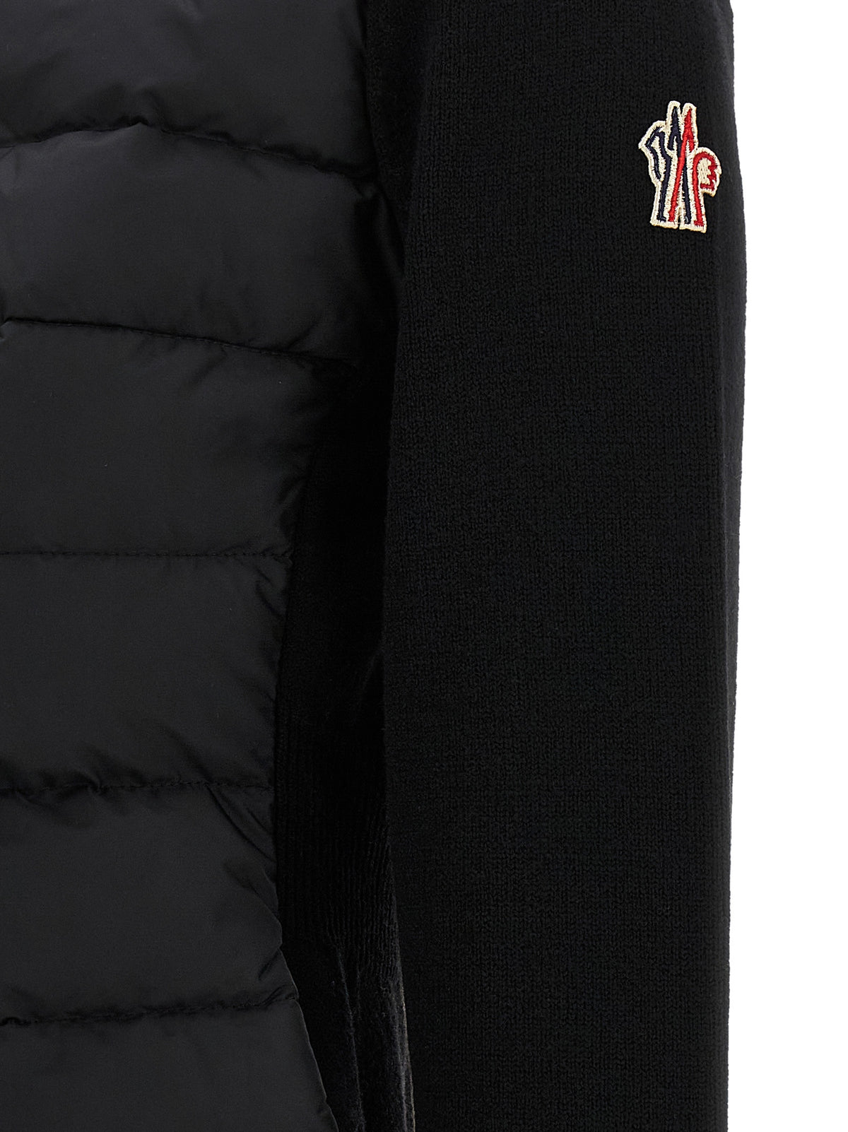 Elevate your style with the Moncler Grenoble Black Polyamide Cardigan, a fusion of luxury and utility crafted from premium materials for the modern connoisseur.