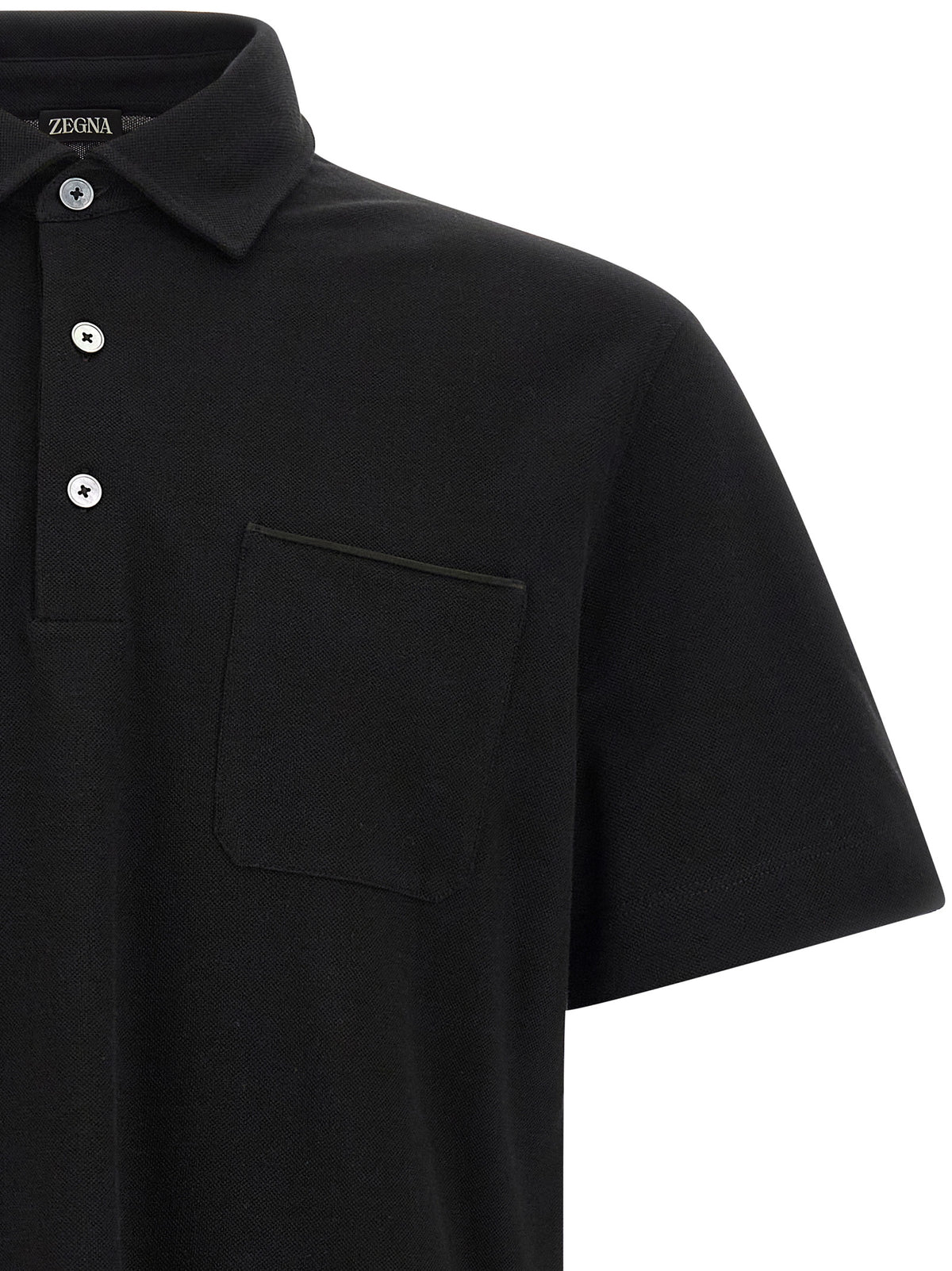 Discover the ZEGNA Black Cotton Polo Shirt, a masterpiece of modern elegance, crafted from pure cotton for those who appreciate refined luxury and timeless style.