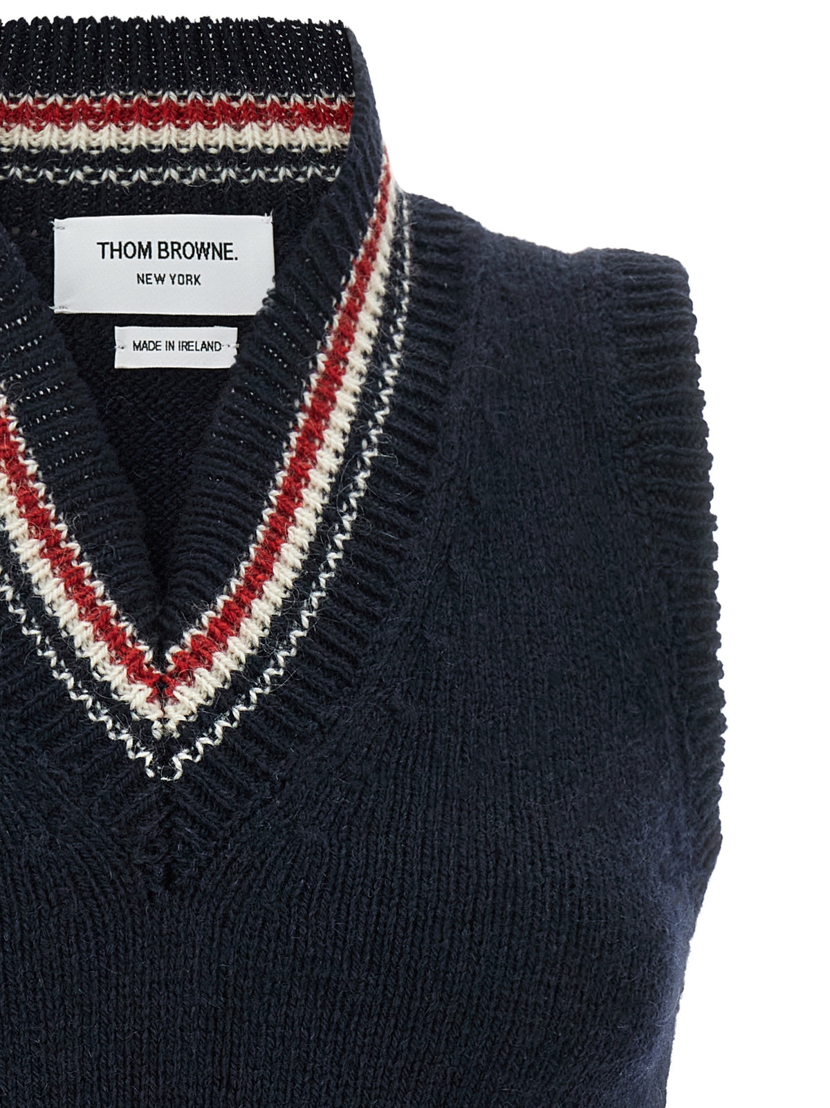 Elevate your wardrobe with the Thom Browne Blue Wool Sleeveless Jacket, a luxurious blend of wool and mohair, embodying timeless elegance and sophisticated allure.
