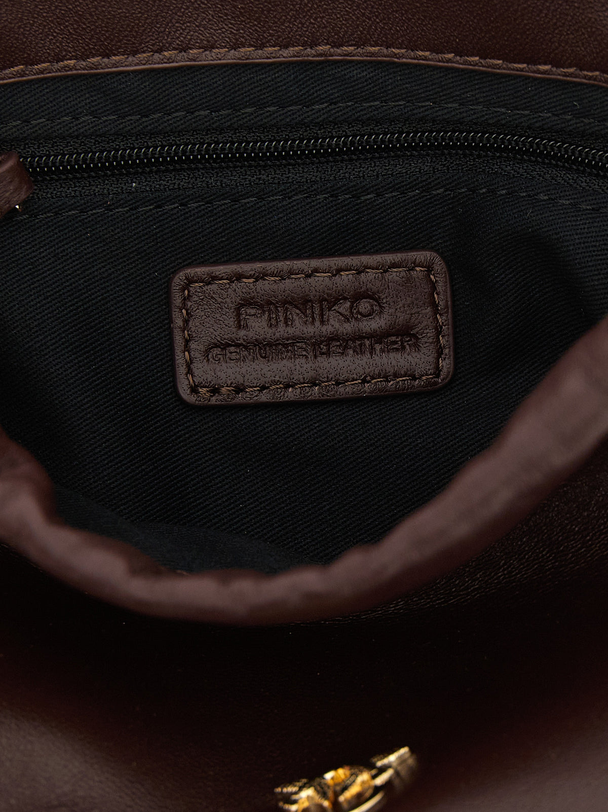 Indulge in the PINKO Bordeaux Lambskin Shoulder Bag, a masterpiece of 100% sheepskin leather, blending iconic elegance with modern versatility for the discerning connoisseur.