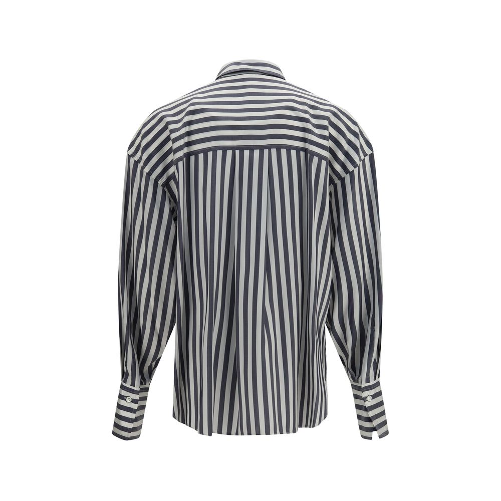 Discover the Brunello Cucinelli Multicolor Silk Shirt, a masterpiece of lightweight silk poplin, designed for those who embody elegance and sophistication.