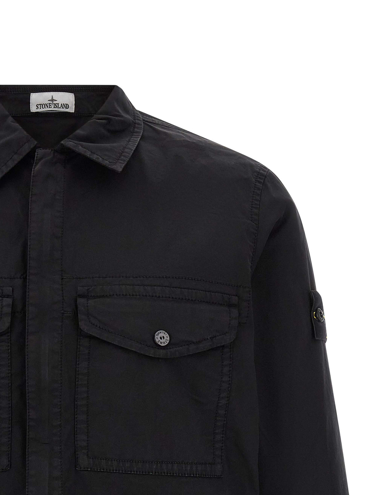 Discover the Stone Island Black Cotton Blouse, a masterful blend of sustainable luxury and bold design, crafted from organic cotton for the discerning individual.