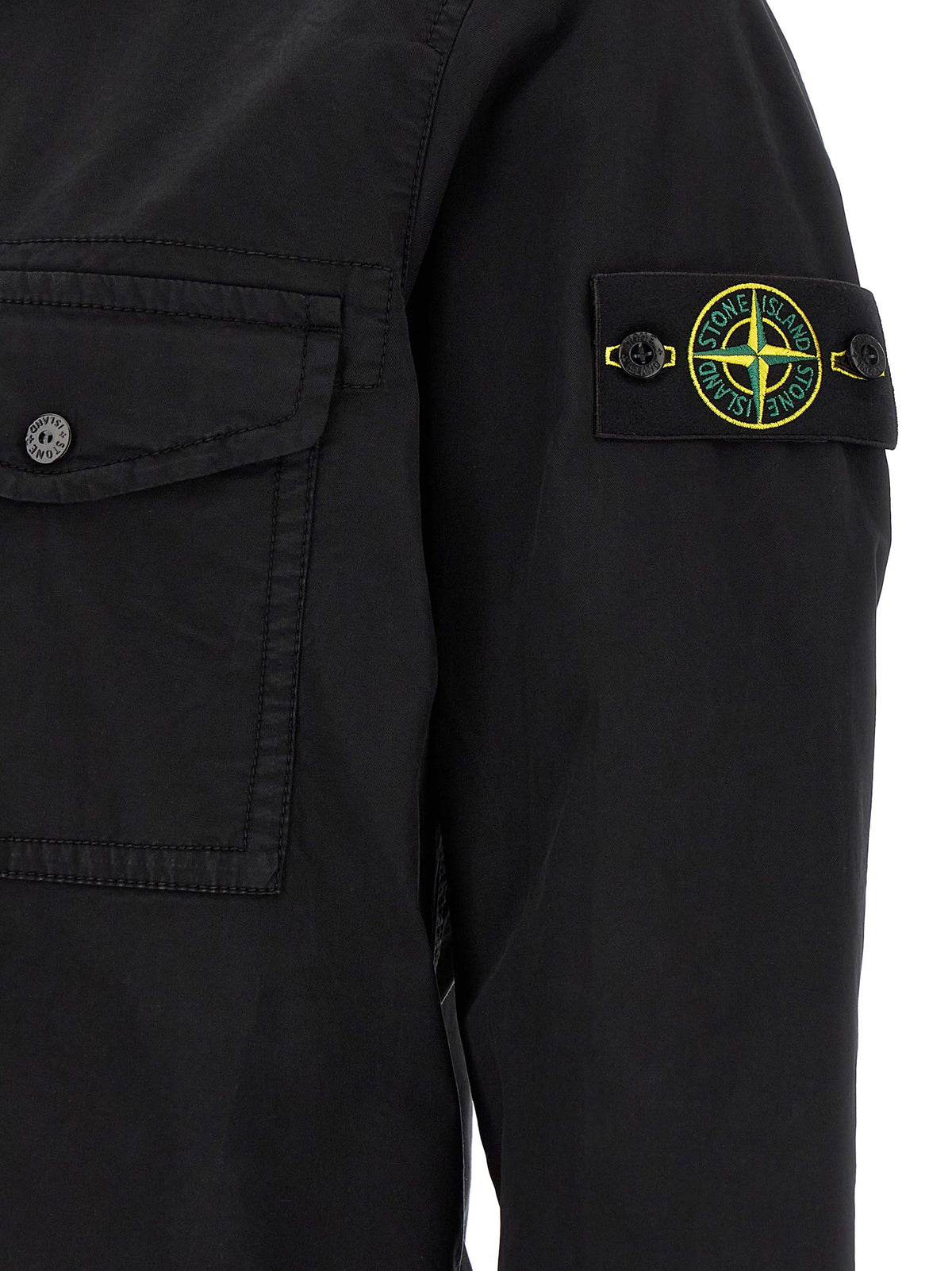 Discover the Stone Island Black Cotton Blouse, a masterpiece of sustainable luxury crafted from 97% organic cotton, blending timeless elegance with modern sophistication.