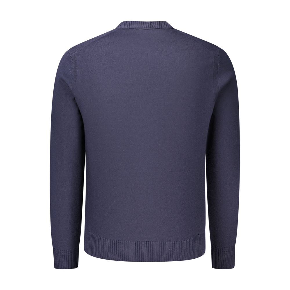 Indulge in the elegance of the Hugo Boss Blue Wool Sweatshirt, a testament to refined craftsmanship and timeless style, perfect for those who embody sophistication.