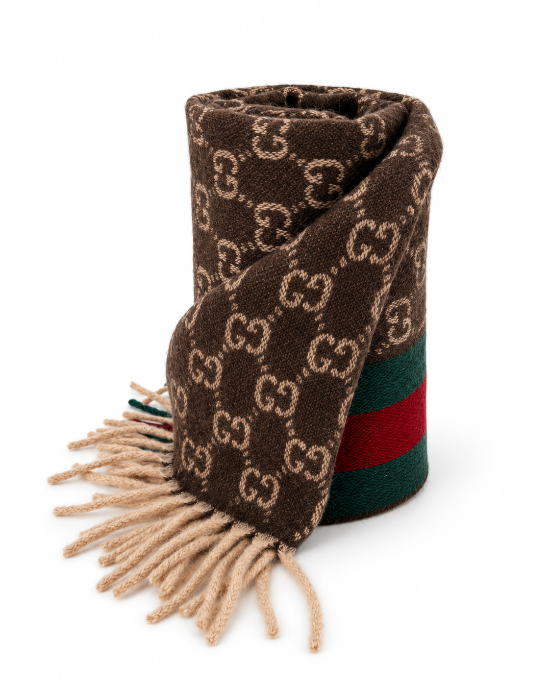Indulge in the elegance of the Gucci Monogram Brown Cashmere & Wool Scarf, a luxurious blend of sophistication and warmth, perfect for the discerning style connoisseur.