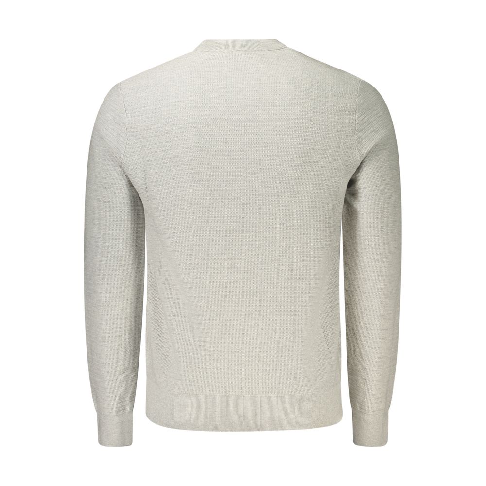 Indulge in the elegance of the Hugo Boss Gray Cotton Sweatshirt, where luxurious comfort meets sophisticated design, perfect for the discerning individual.