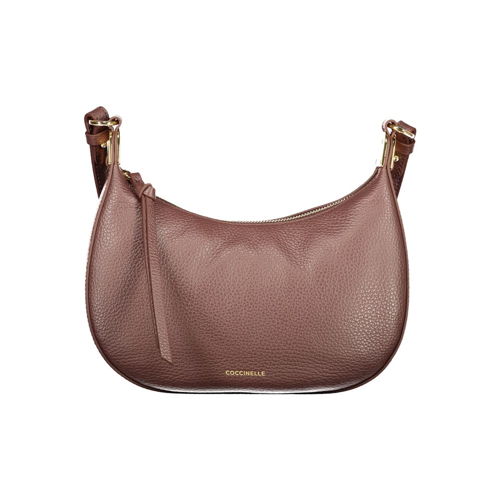 Indulge in the exquisite Coccinelle Brown Leather Handbag, a symbol of refined elegance, featuring contrasting details and impeccable craftsmanship for the discerning individual.
