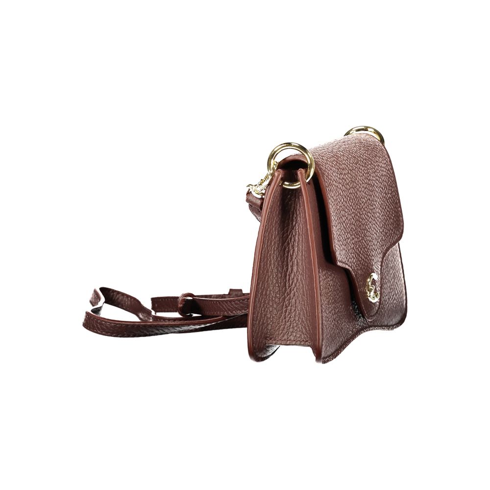 Discover the Coccinelle Brown Leather Handbag, a symbol of sophistication and artistry, perfect for those who embrace elegance and timeless style.