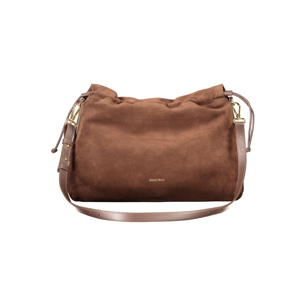 Indulge in the elegance of the Coccinelle Brown Leather Handbag, a masterpiece of suede craftsmanship that embodies timeless luxury and sophisticated allure.