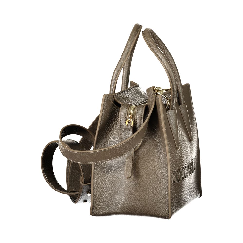 Discover the Coccinelle Brown Leather Handbag, a symbol of elegance and sophistication, featuring exquisite craftsmanship and timeless design for the discerning individual.