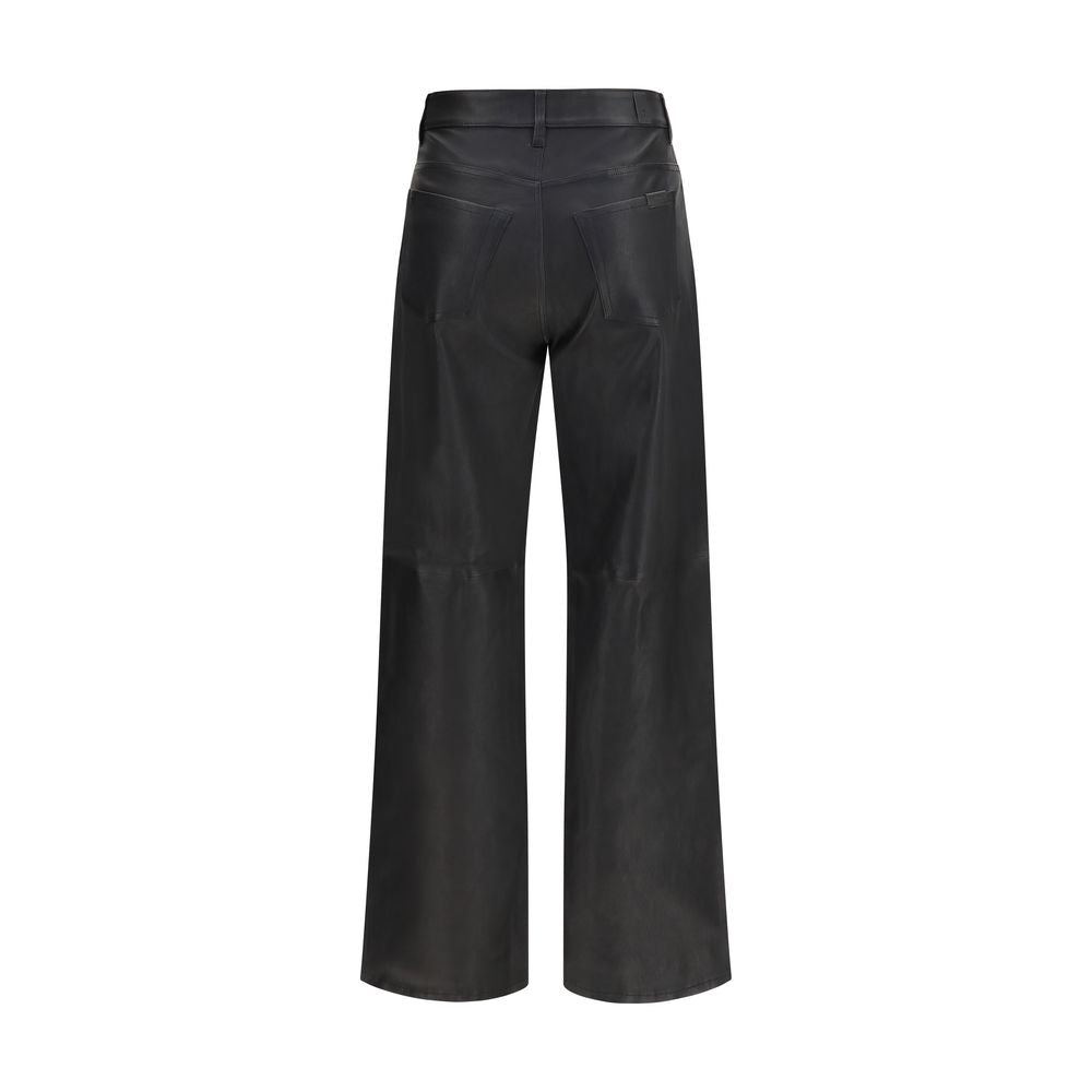 Indulge in the exquisite allure of 7FOR Black Leather Pants, crafted from 100% calf leather for a timeless, sophisticated silhouette that enhances your wardrobe's elegance.