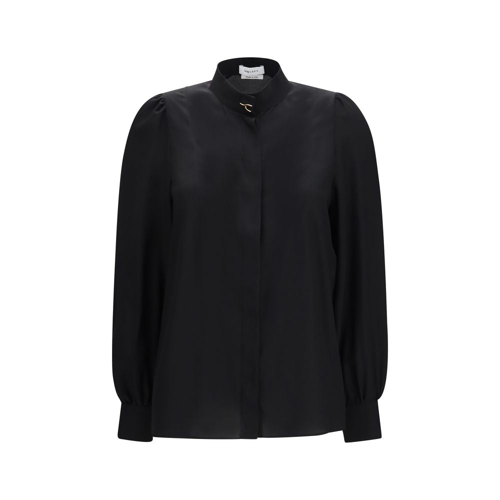 Indulge in the elegance of the Alexander McQueen Black Silk Blouse, where exquisite silk crêpe de chine meets luxurious gold-tone embellishments, embodying timeless sophistication.