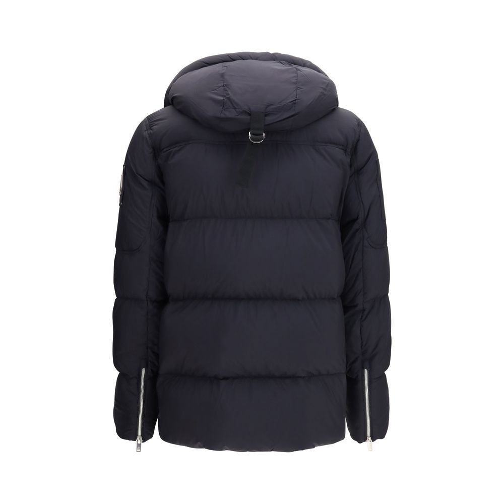 Indulge in the exquisite Everest 3Q Puffer by Moose Knuckles, crafted for ultimate warmth and style with premium duck down insulation and a luxurious black nylon finish.