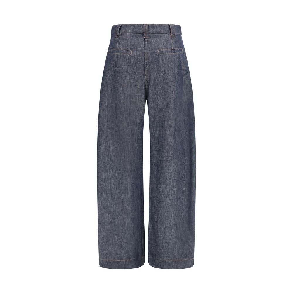 Discover the exquisite Brunello Cucinelli Blue Cotton High-Waisted Jean, where luxurious craftsmanship meets refined style, perfect for the discerning individual.