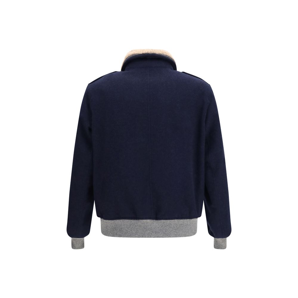Indulge in the exquisite Brunello Cucinelli Blue Cashmere Full-Length Jacket, crafted from pure cashmere with a sumptuous shearling collar, embodying timeless luxury and sophistication.