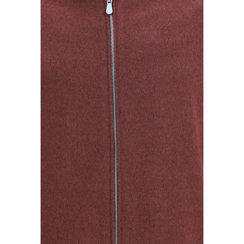 Discover the Brunello Cucinelli Bordeaux Wool Oves Aries Full-Length Jacket, a masterpiece of 100% Merino wool, blending refined craftsmanship with contemporary elegance for the discerning individual.