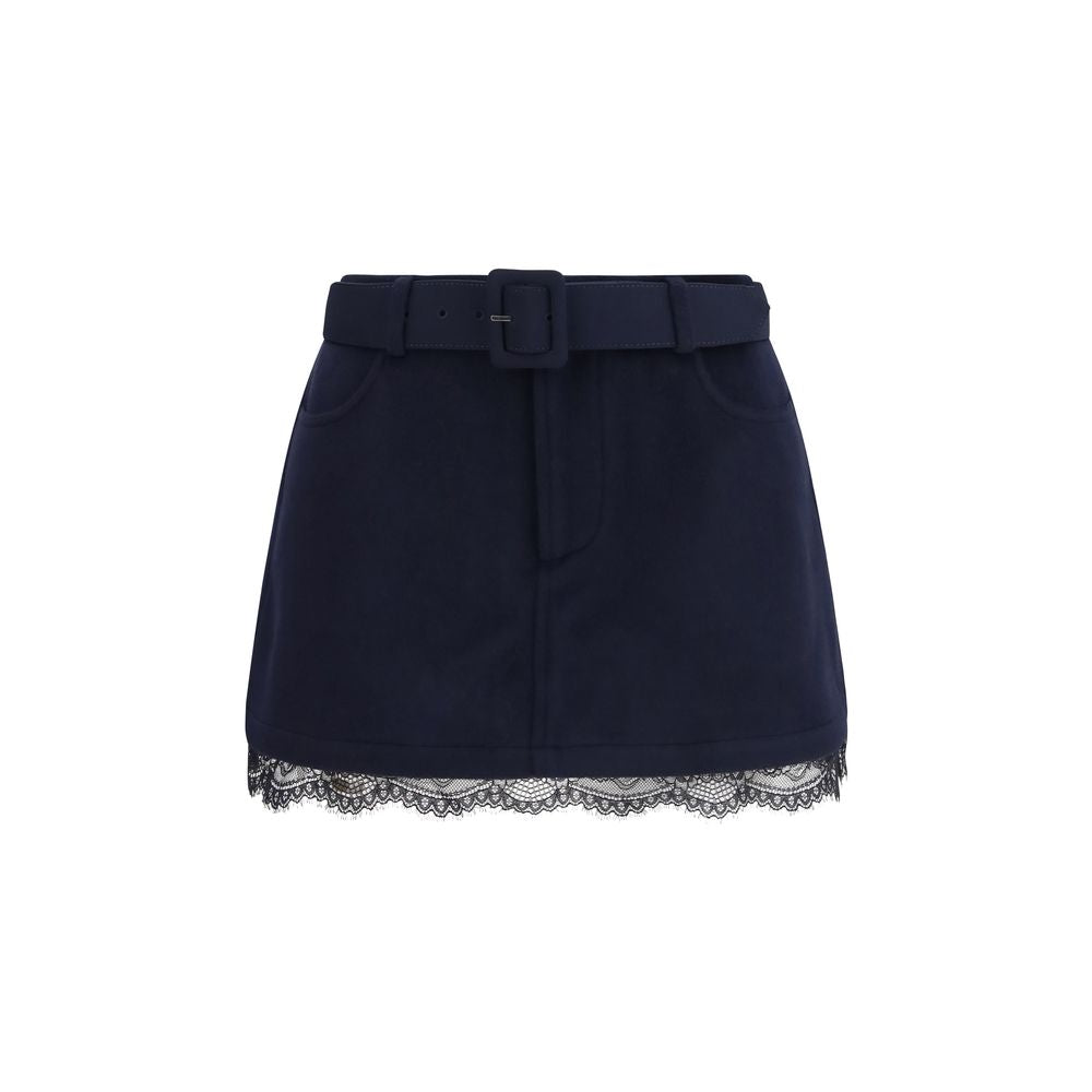 Discover the exquisite Self-Portrait Blue Wool Oves Aries Bermuda Shorts, a luxurious blend of Merino wool and lace, embodying timeless elegance for the discerning individual.