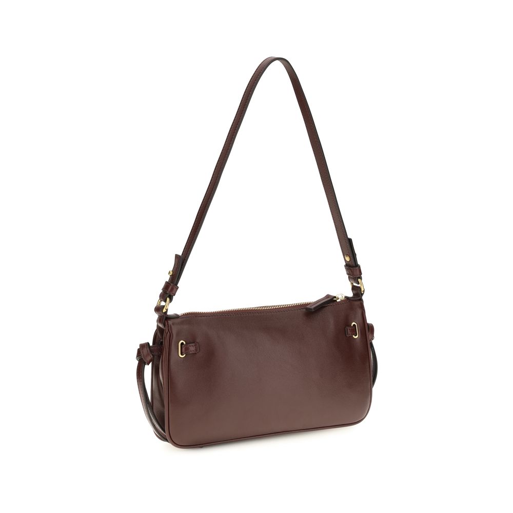 Discover the Chloé Bordeaux Calf Leather Bos Taurus Shoulder Bag, a masterpiece of exquisite craftsmanship and timeless elegance, perfect for the discerning individual.