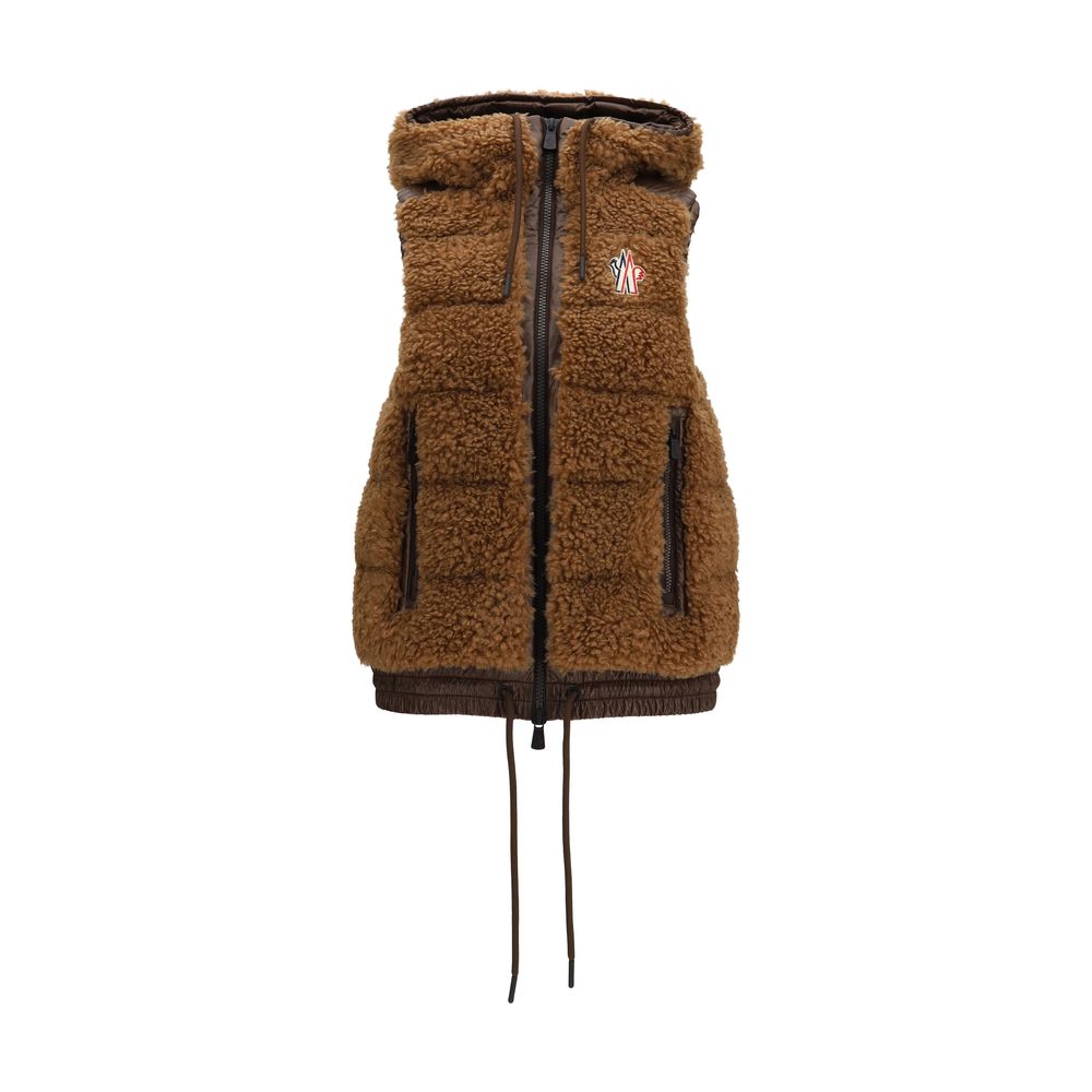 Discover the Moncler Grenoble Brown Polyamide Sleeveless Jacket, a luxurious blend of warmth and style, perfect for the discerning individual who values exquisite craftsmanship and timeless elegance.