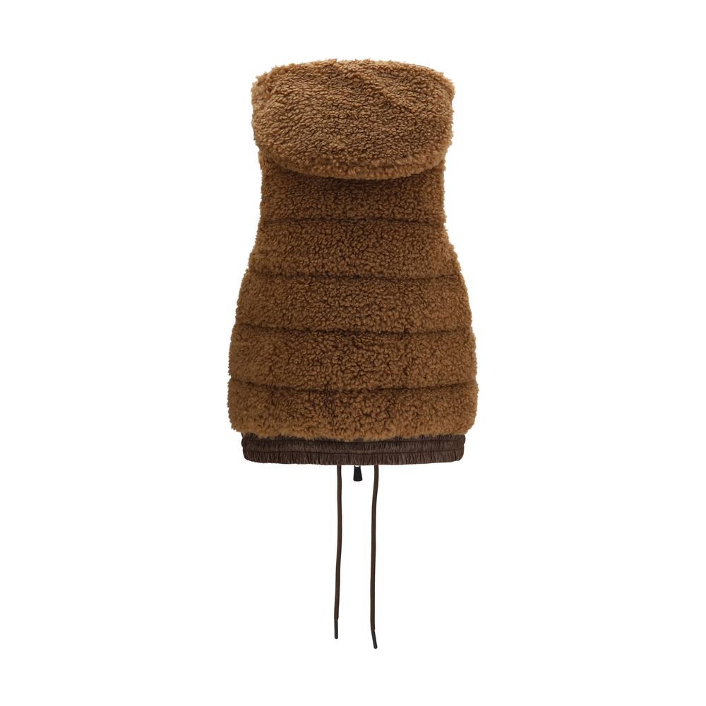 Discover the Moncler Grenoble Brown Polyamide Sleeveless Jacket, a masterpiece of luxurious craftsmanship, designed for effortless layering and timeless elegance.