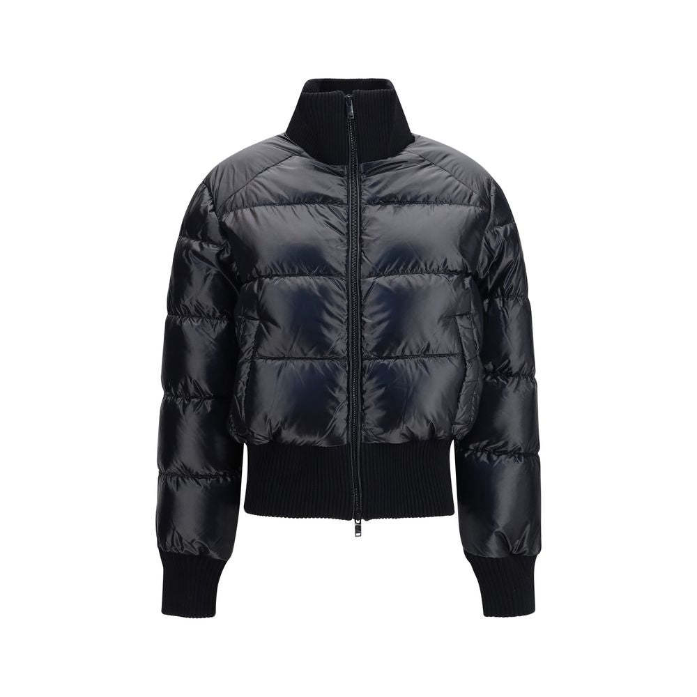 Indulge in the elegance of the Moose Knuckles Queens Down Puffer, crafted from luxurious nylon with plush insulation, designed for the discerning individual who embraces sophistication and warmth in style.