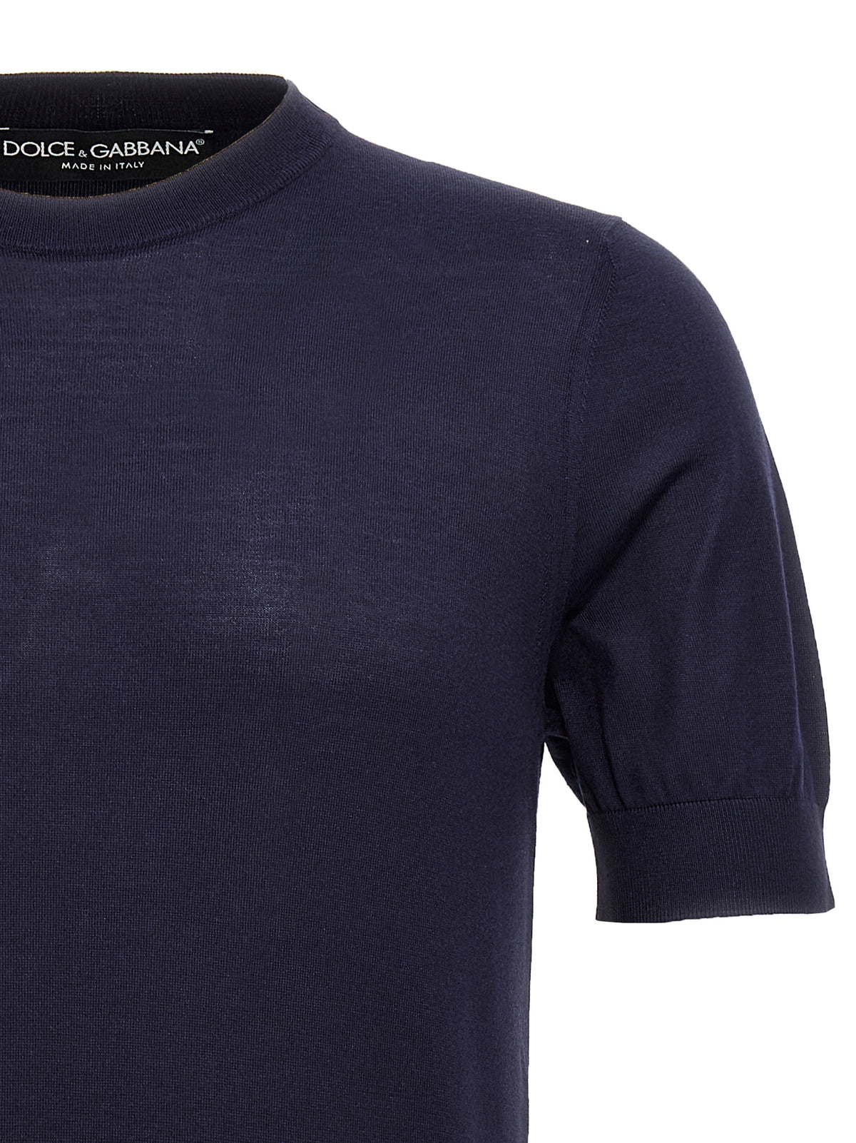 Indulge in the elegance of the Dolce & Gabbana Blue Silk Cardigan, a luxurious piece crafted in Italy, perfect for elevating any sophisticated wardrobe.