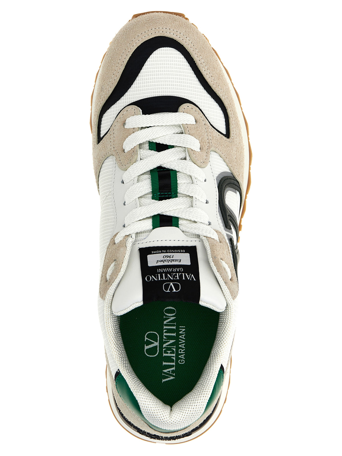 Elevate your style with Valentino Garavani's VLogo Pace sneakers, a luxurious blend of suede and leather, crafted in Italy for the discerning individual.