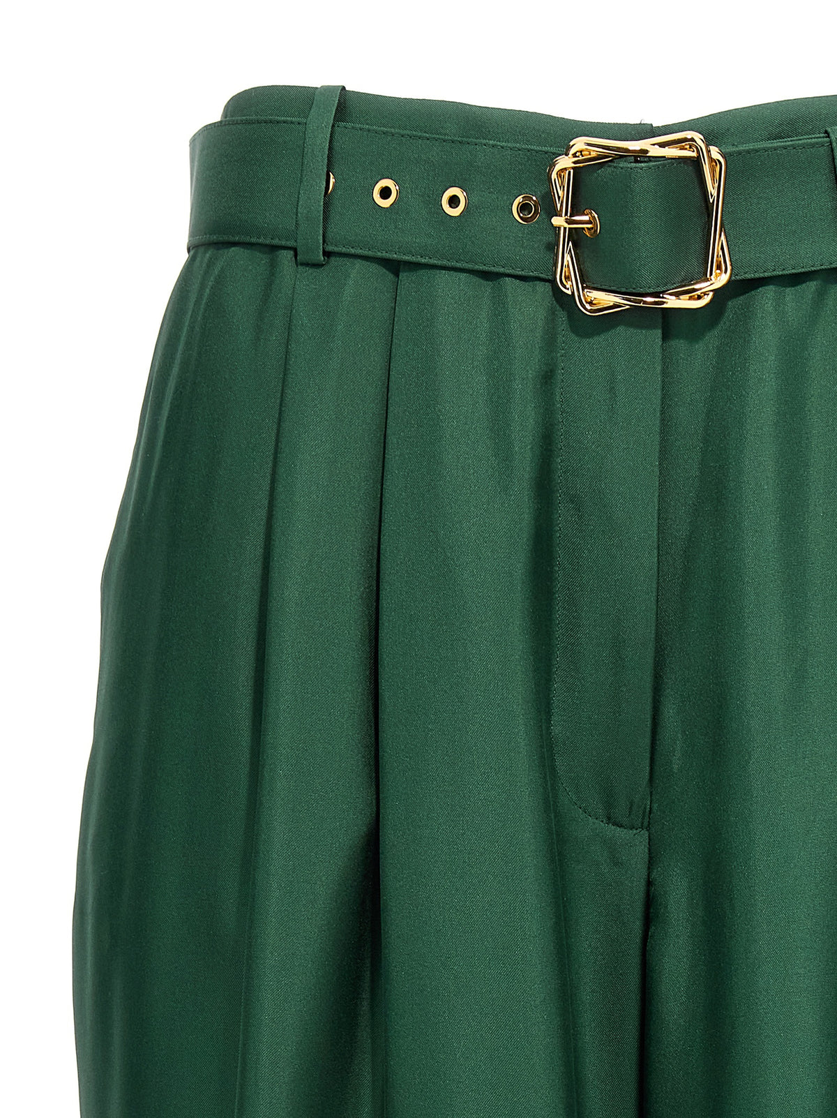 Discover the Pavilion silk pants by Zimmermann, where exquisite craftsmanship and a striking green hue redefine luxury for the modern trendsetter.
