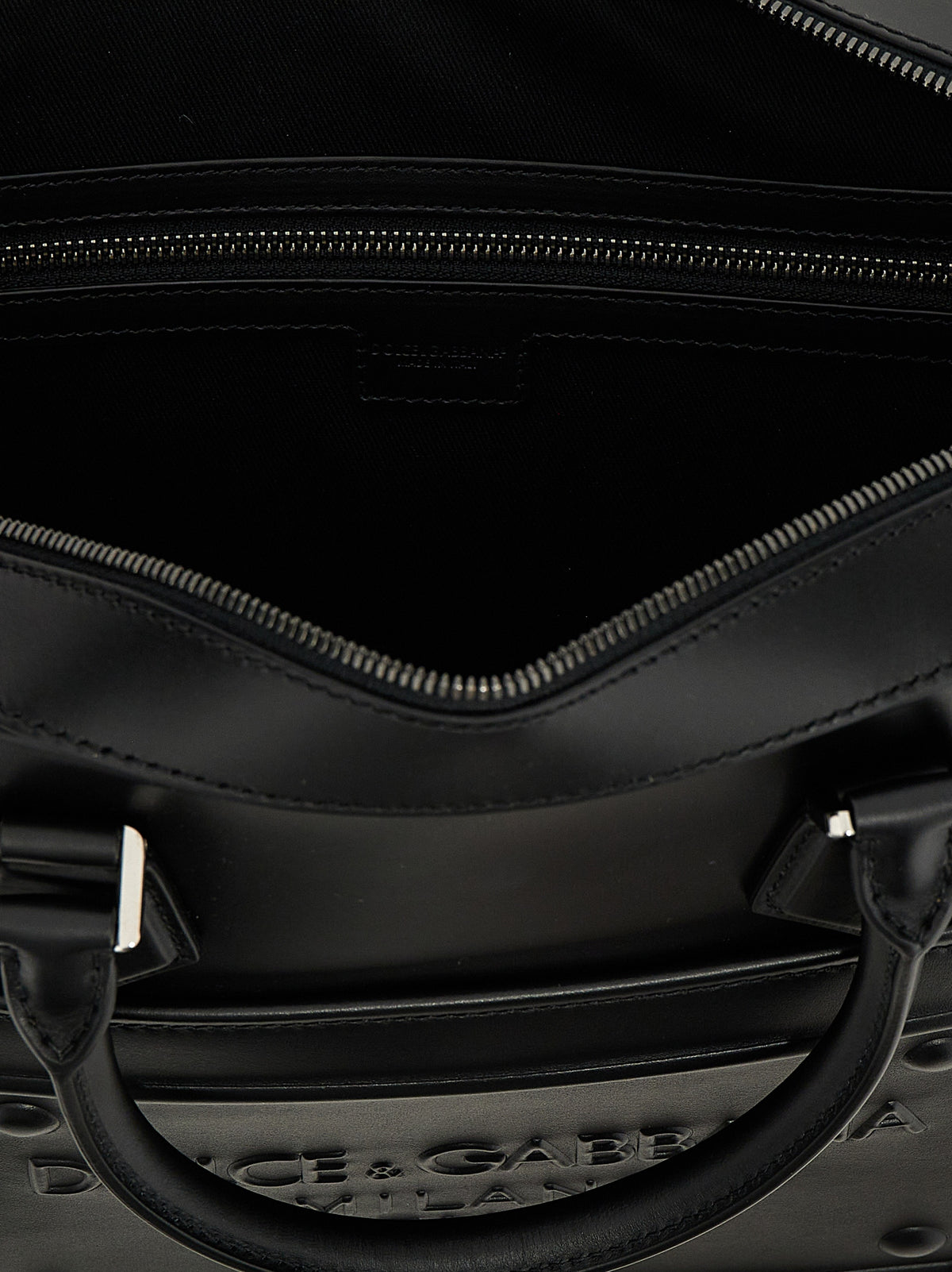 Discover the Dolce & Gabbana Black Lamb Leather Tote Bag, a masterpiece of Italian craftsmanship that embodies luxury and sophistication for the discerning individual.