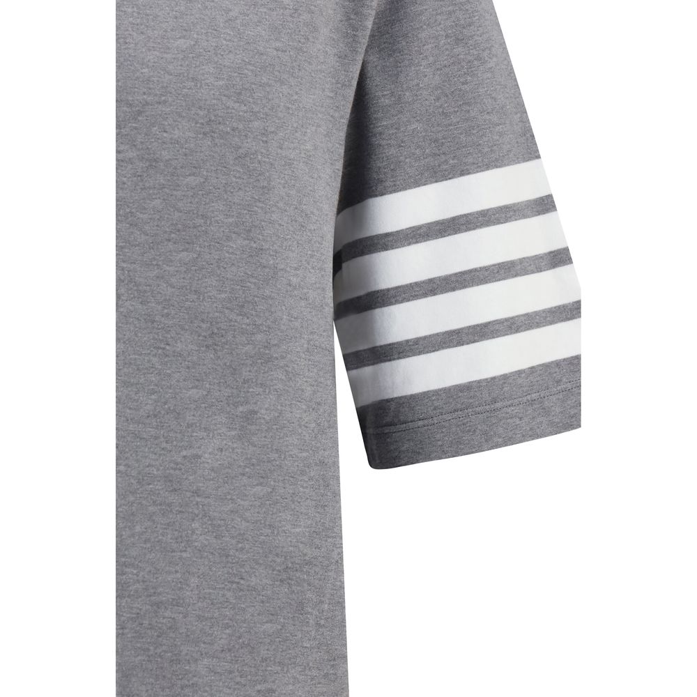 Discover the Thom Browne Gray Cotton T-Shirt, where exquisite craftsmanship meets timeless elegance, perfect for those who embody sophistication and style.
