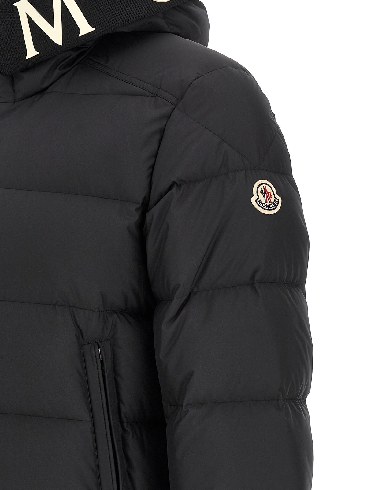 Experience the exquisite allure of the Moncler Black Polyester Full-Length Jacket, a masterclass in luxury and sophistication, crafted for timeless elegance and warmth.