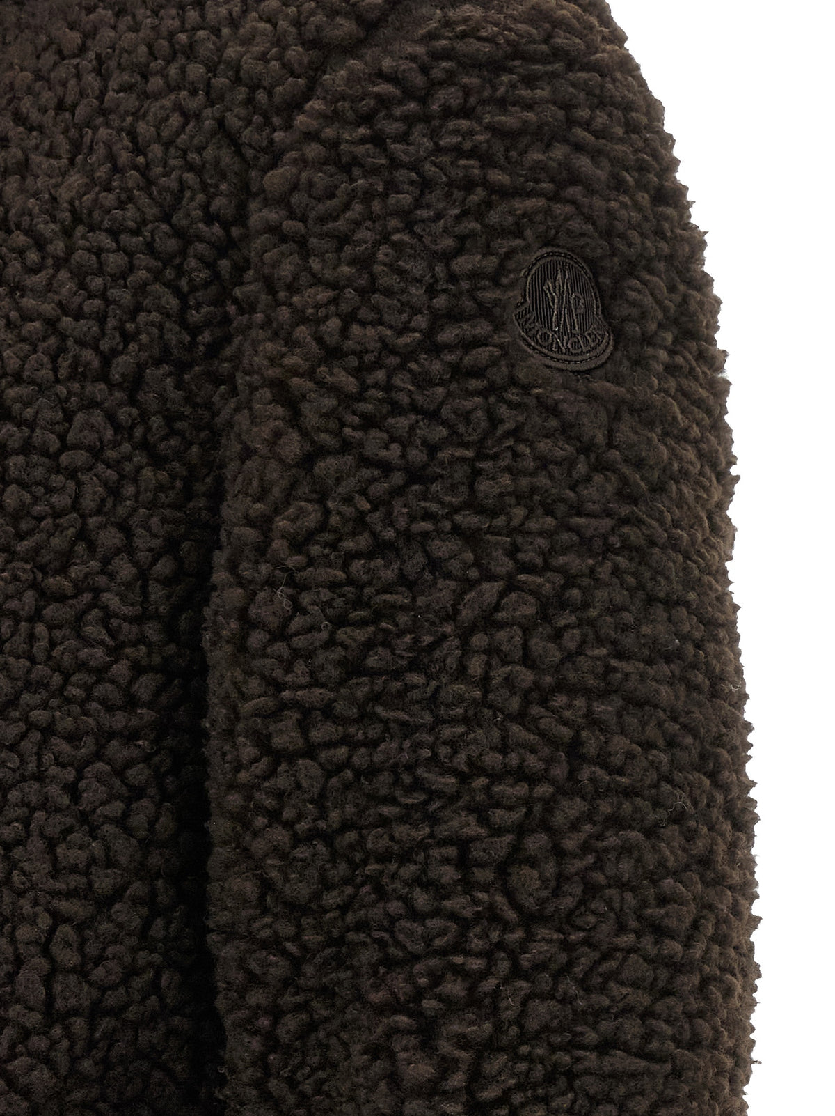 Experience the allure of the Moncler Brown Full-Length Jacket, a fusion of luxurious materials and exquisite craftsmanship, perfect for those who embrace elegance and sophistication.
