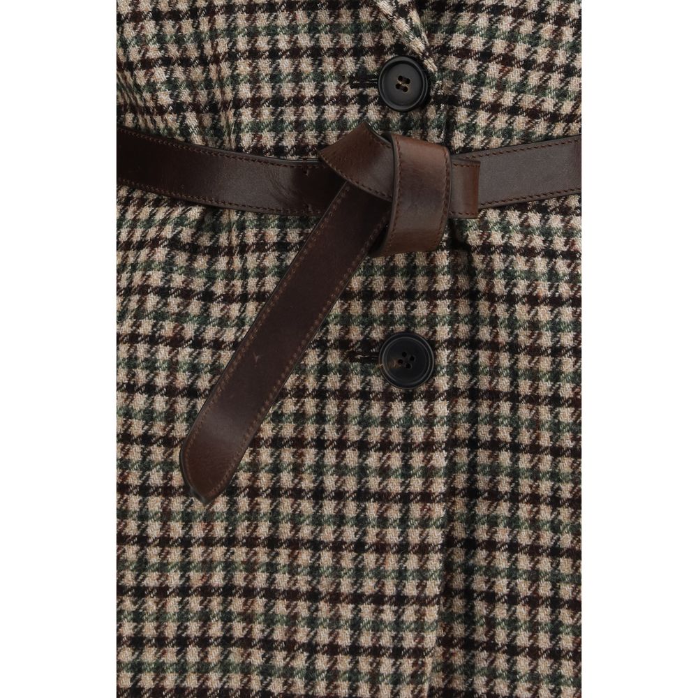 Indulge in the Brunello Cucinelli Beige Mohair Blazer, a testament to artisanal craftsmanship, blending luxurious mohair and wool for timeless elegance and sophistication.
