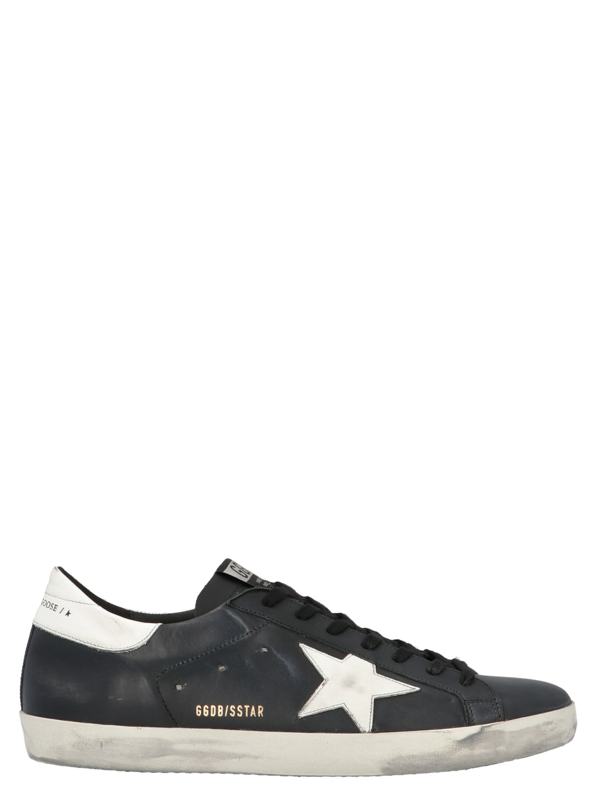 Elevate your style with Golden Goose Black Cowhide Low Top Sneakers, where Italian craftsmanship meets urban elegance for a statement of luxury in every stride.
