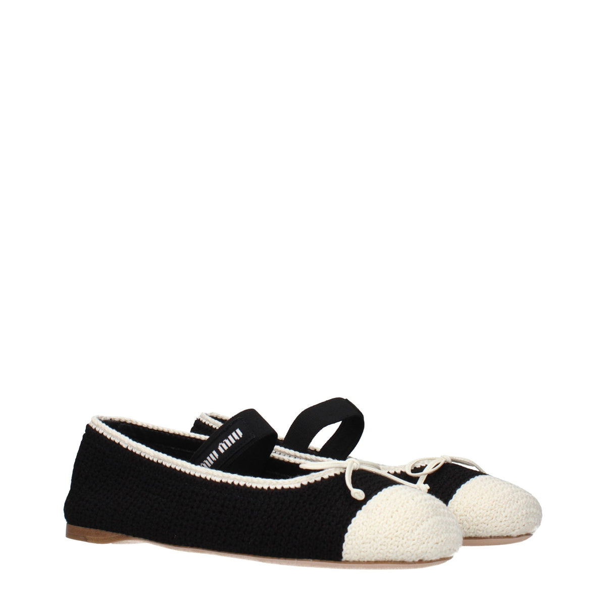 Step into the world of Miu Miu with these Black Fabric Ballet Flats, where exquisite craftsmanship meets timeless elegance, perfect for the discerning individual.