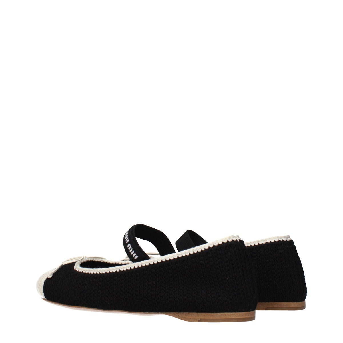 Experience the allure of Miu Miu Black Fabric Ballet Flats, where exquisite craftsmanship meets timeless elegance, elevating your style with every step.