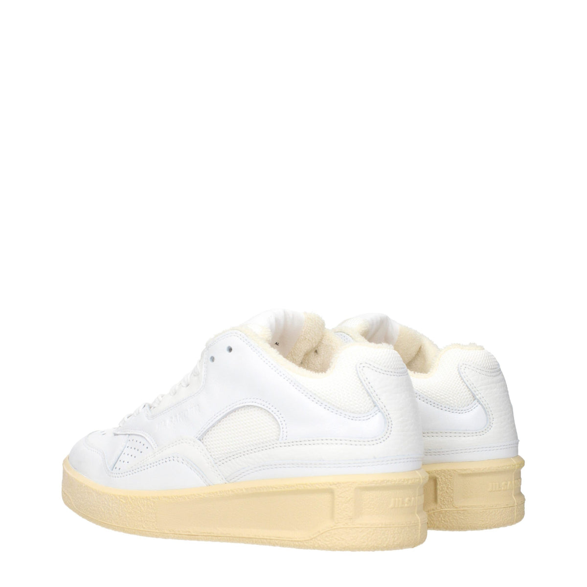 Experience the allure of Jil Sander White Leather Low Top Sneakers, where exquisite craftsmanship meets timeless elegance, elevating your style with each step.