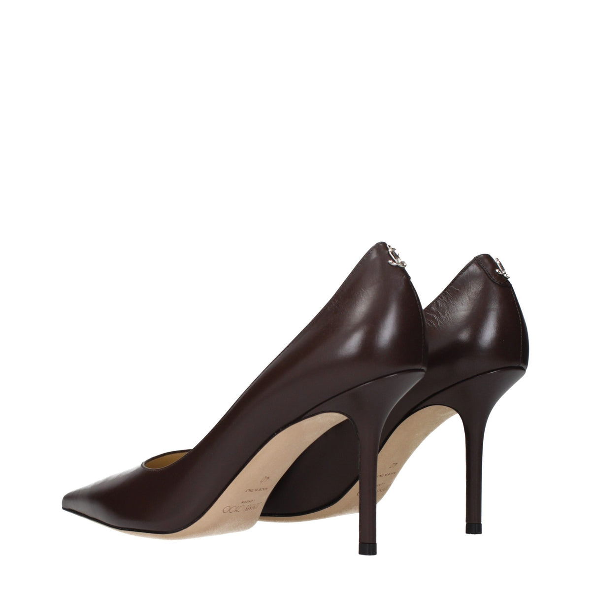 Step into a realm of sophistication with Jimmy Choo's Brown Leather High Heel Pumps, a timeless blend of exquisite craftsmanship and luxurious allure, perfect for the discerning individual.