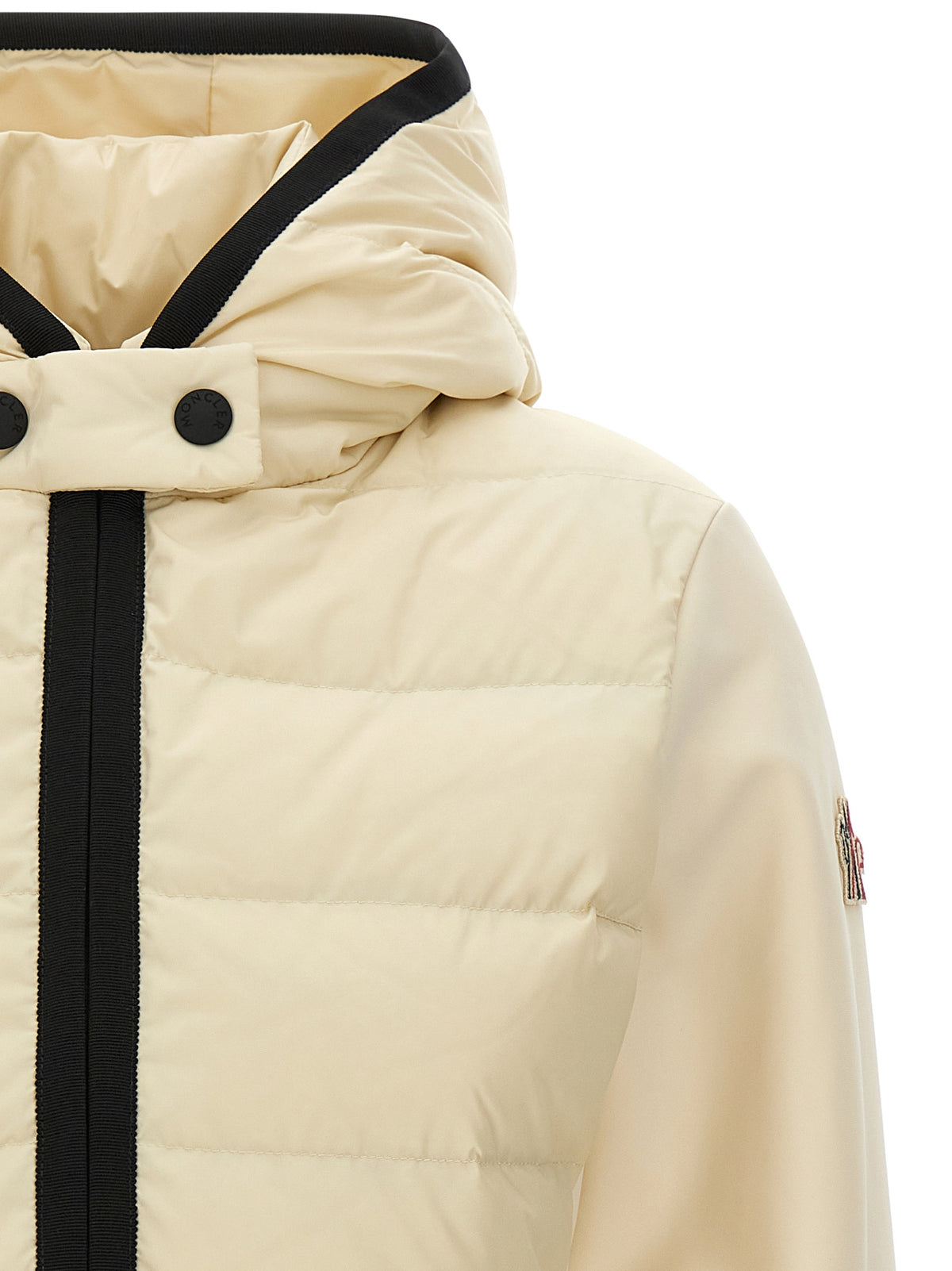 Elevate your wardrobe with the Moncler Grenoble Padded Zip-Up Cardigan, where exquisite craftsmanship meets modern luxury in a timeless silhouette that exudes sophistication.