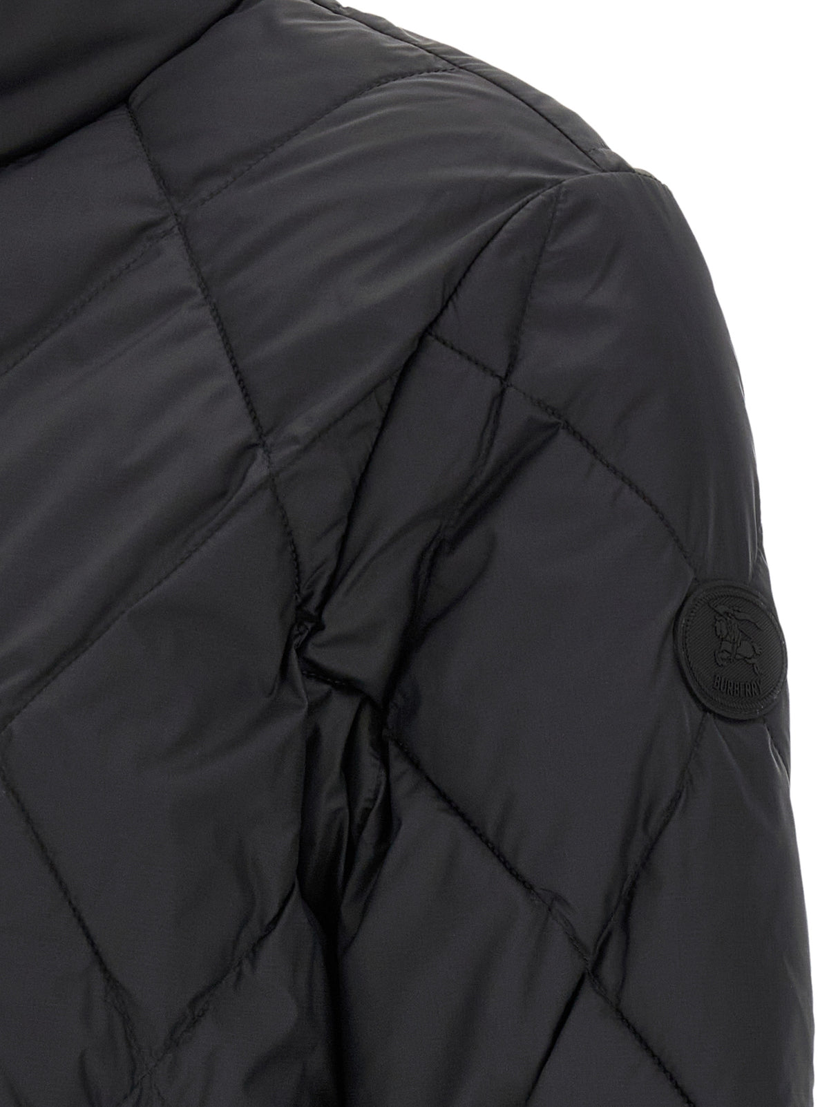 Indulge in the Burberry Bramford Black Polyamide Shell Jacket, where exquisite craftsmanship meets timeless elegance, perfect for the discerning style connoisseur.