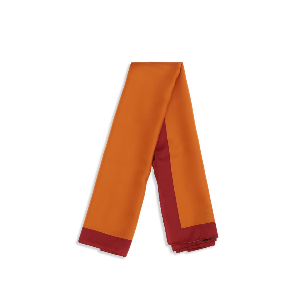 Experience the allure of the Saint Laurent Orange Silk Foulard, a luxurious 100% silk accessory that embodies timeless elegance and exquisite Italian craftsmanship.