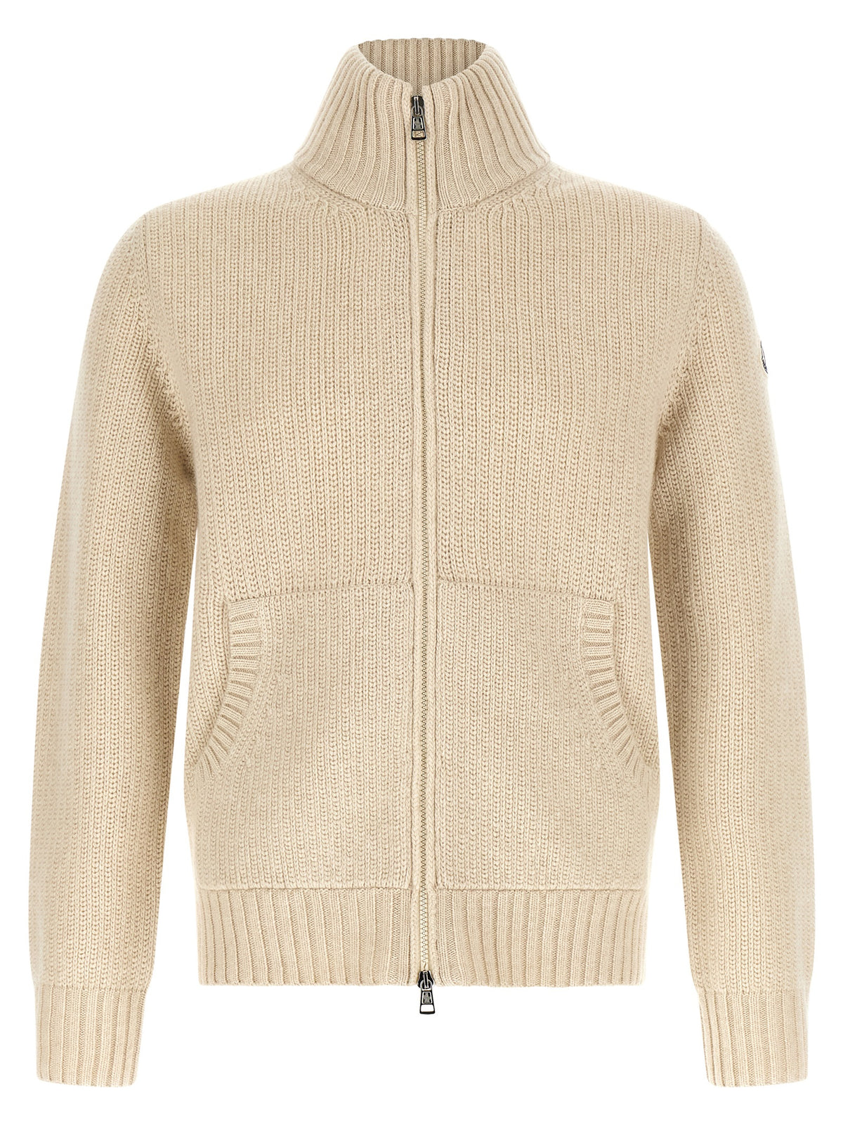 Indulge in the Moncler Beige Virgin Wool Cardigan, a timeless luxury essential crafted from premium virgin wool and cashmere, embodying refined elegance and sophistication.