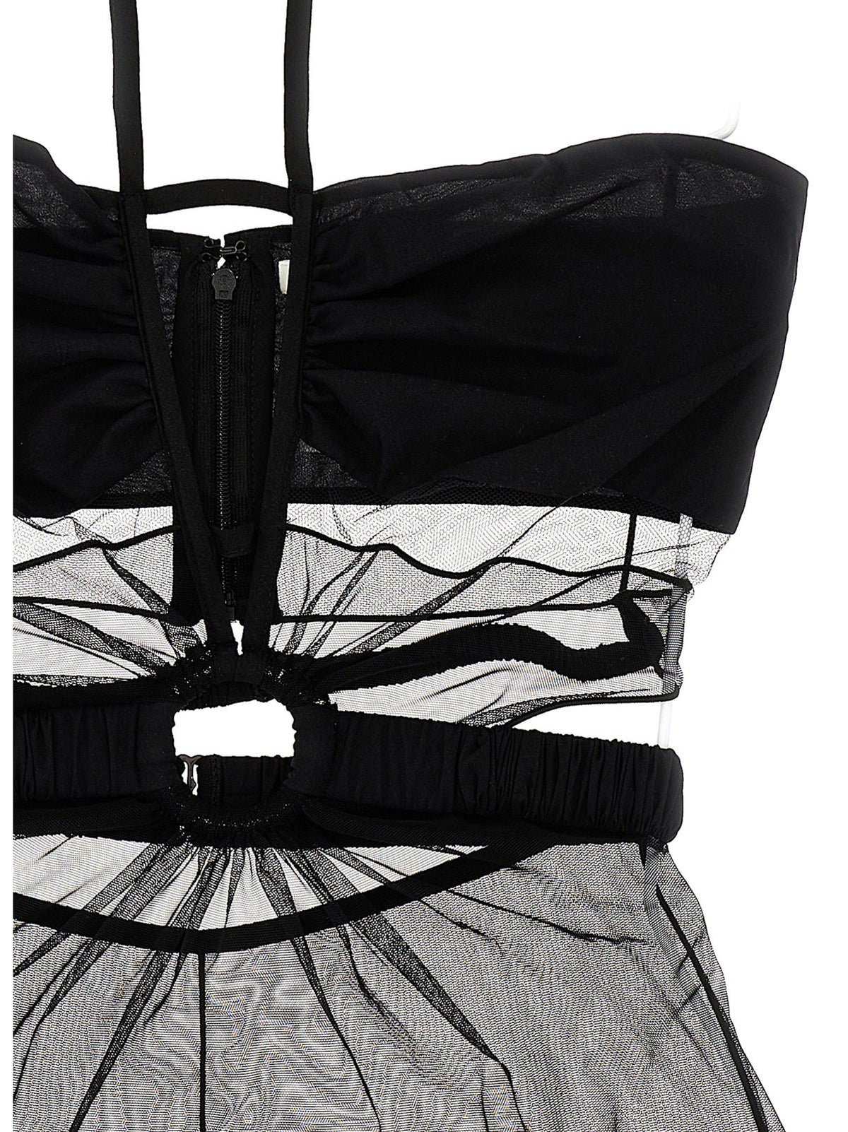 Elevate your allure with the Nensi Dojaka Black Polyamide Bodysuit, a masterpiece of Italian craftsmanship featuring artful cut-outs and a seductive bare back, perfect for glamorous occasions.