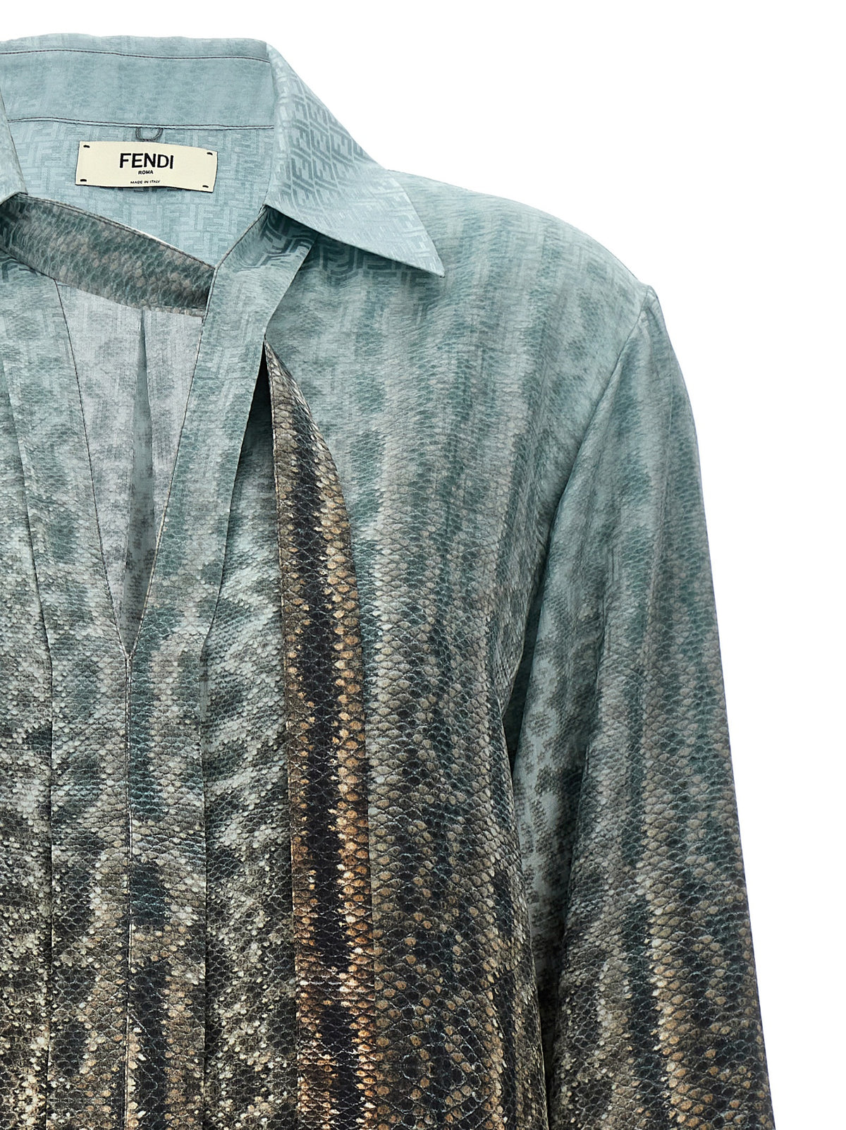 Elevate your wardrobe with the Fendi Multicolor Silk Blouse, a luxurious statement piece crafted in Italy, showcasing exquisite animal print artistry and sophisticated design.