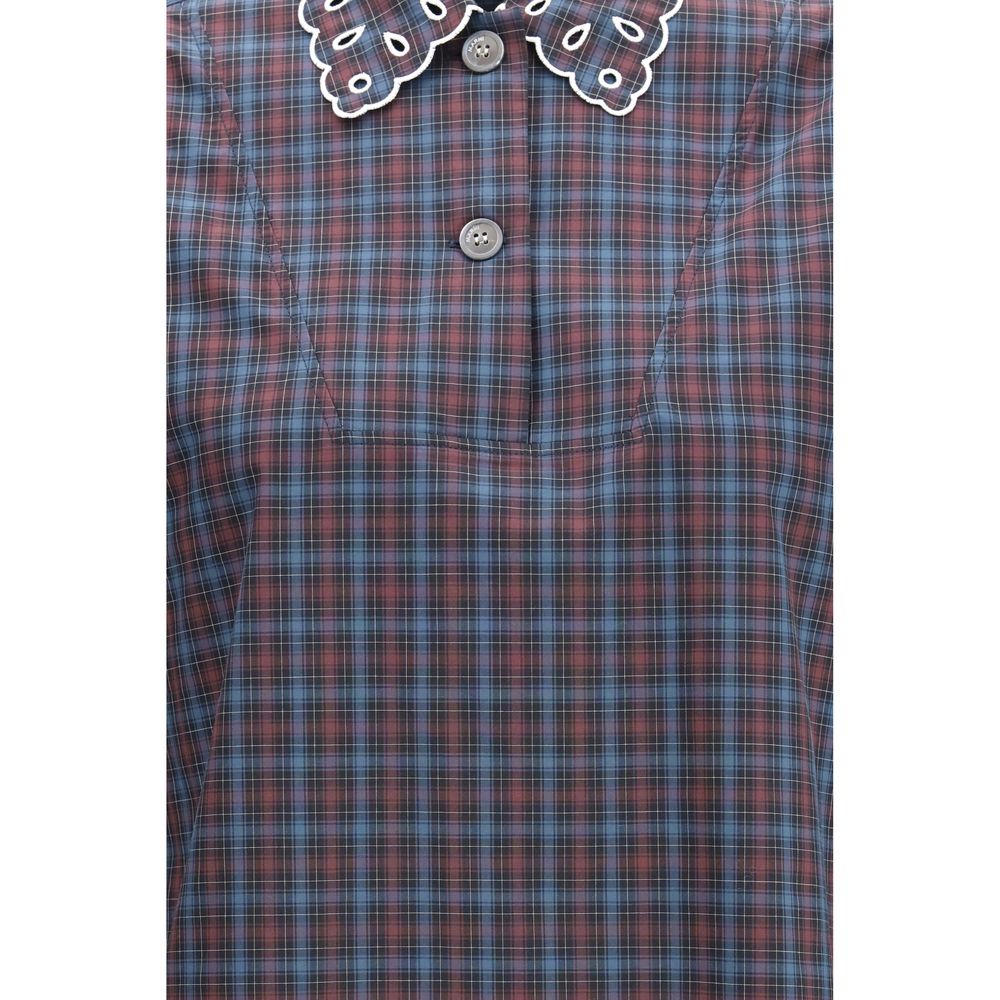 Elevate your wardrobe with the Marni Blue Cotton Pattern Shirt, a masterpiece of checked cotton and broderie anglaise, embodying timeless luxury and effortless sophistication.