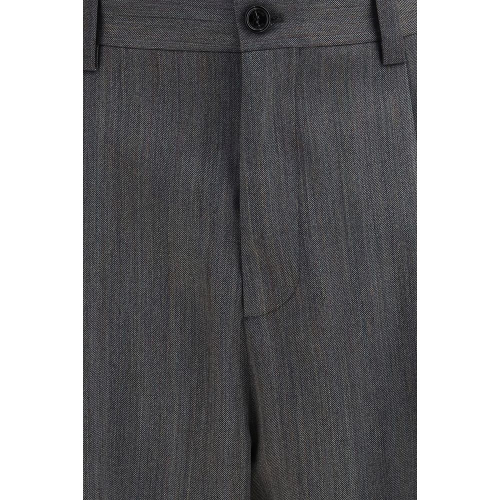 Elevate your wardrobe with Valentino Garavani's Gray Wool Oves Aries Dress Pants, crafted from pure virgin wool, embodying timeless elegance and refined sophistication.