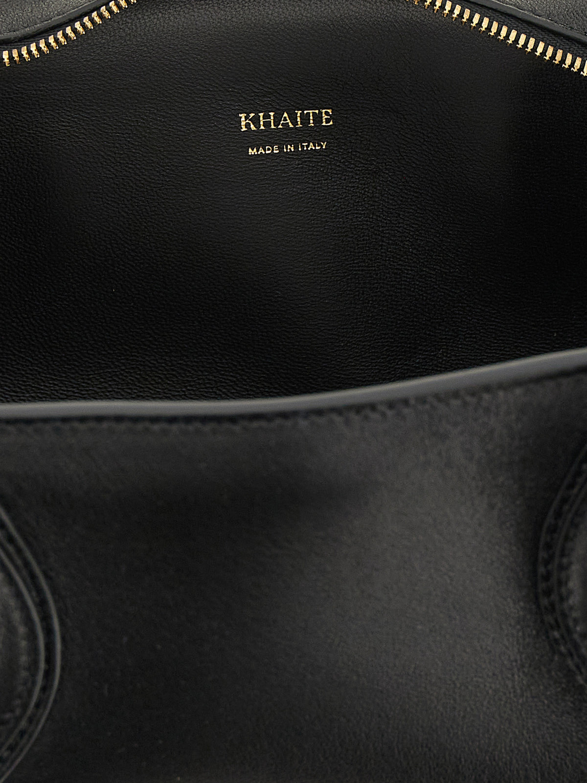 Elevate your style with the Khaite Black Lamb Leather Shoulder Bag, a masterpiece of Italian craftsmanship that embodies luxurious sophistication and timeless elegance.